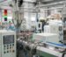 Modern blown film extruder machinery in a manufacturing environment